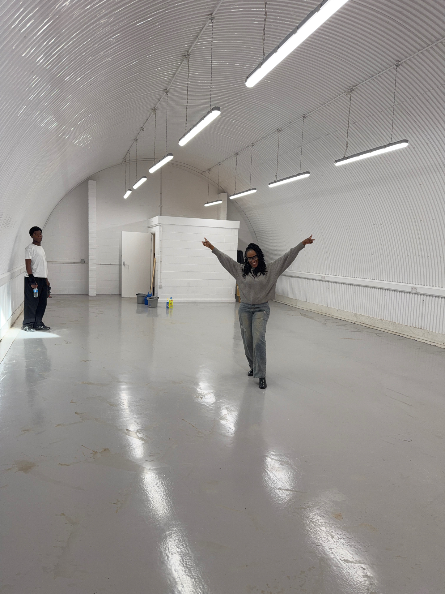 Natasha celebrating inside The Vegan Patty Lady's new production facility